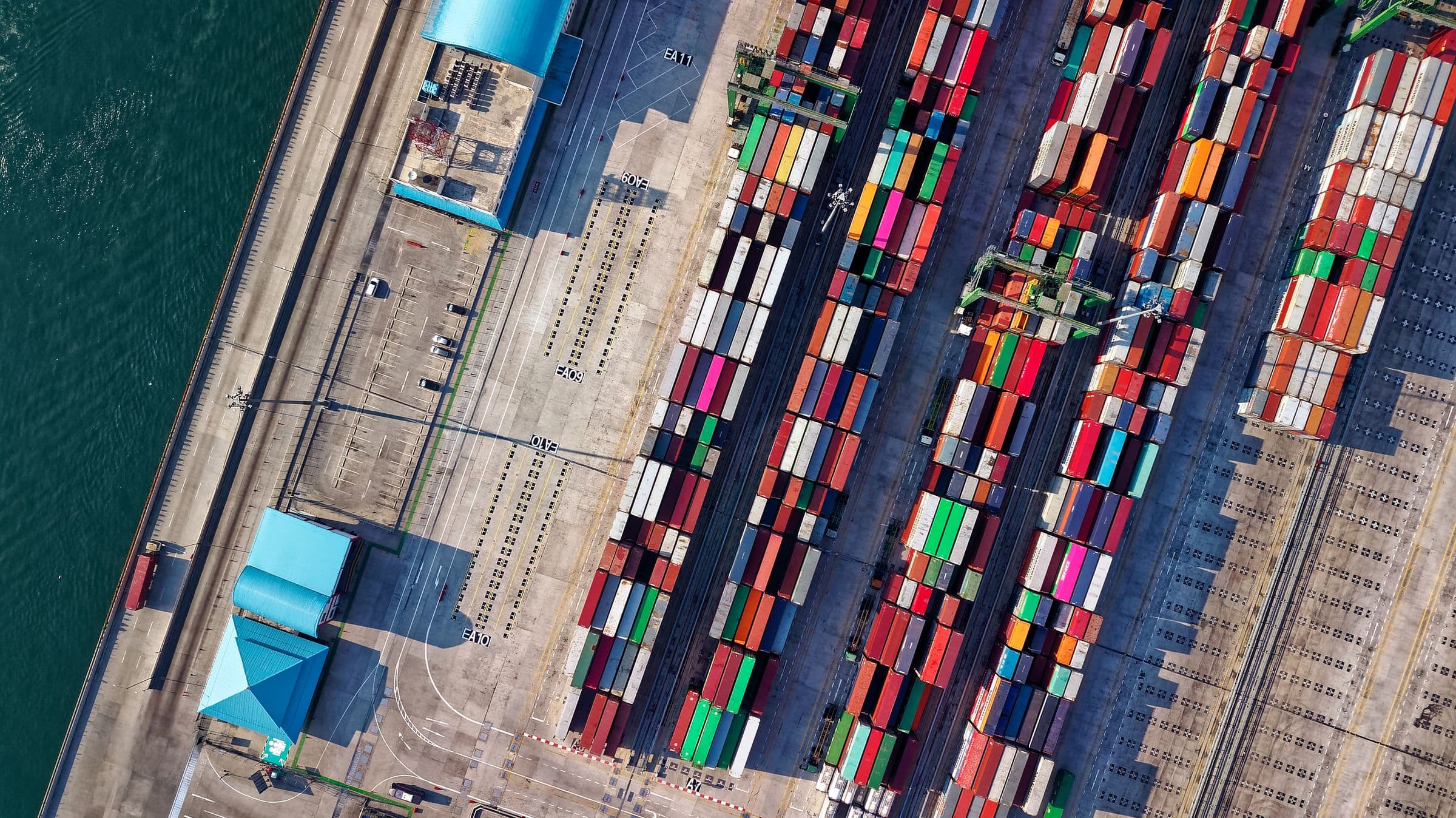 Aerial view of containers staged at a marine terminal awaiting loading